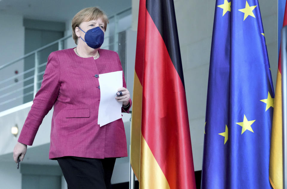 German Chancellor Angela Merkel arrives for a press conference at the Chancellery in Berlin, Germany, Friday, May 21, 2021 following the virtual 'Global Health Summit'. (AP Photo/Michael Sohn, pool)