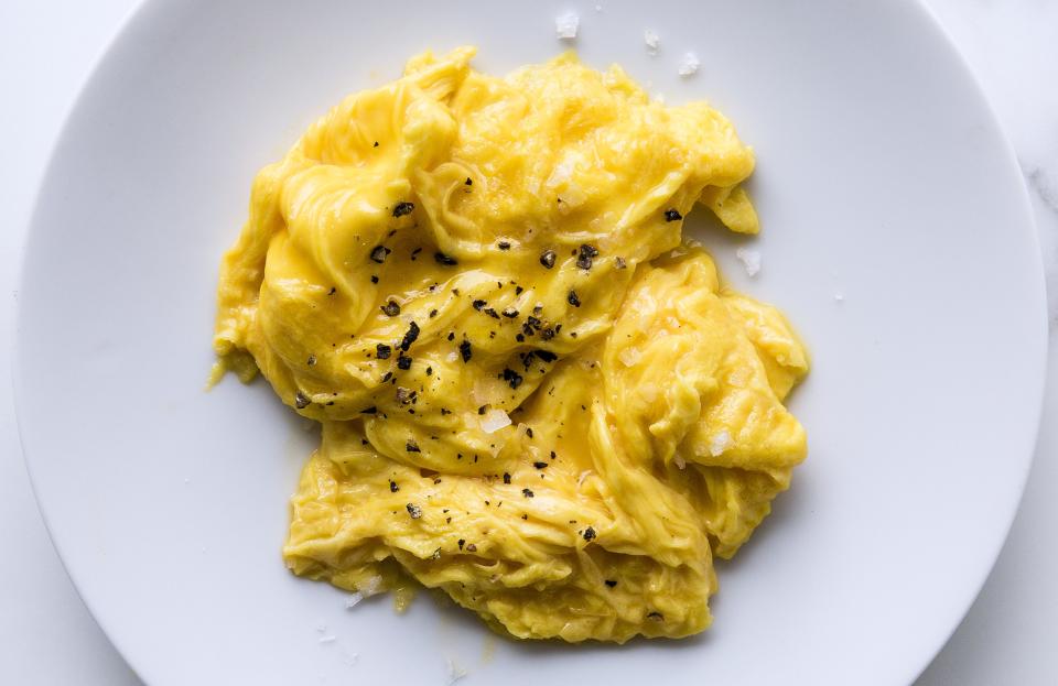 Medium-low heat is the key to the fluffy, creamy, melty texture of these eggs. We like to serve them when they’re still runny, but keep them on the stove for another 15 seconds if you prefer them completely set.