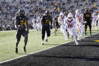 Missouri running back Larry Rountree III (34) scores during the second half of an NCAA college football game against Arkansas Saturday, Dec. 5, 2020, in Columbia, Mo. (AP Photo/L.G. Patterson)