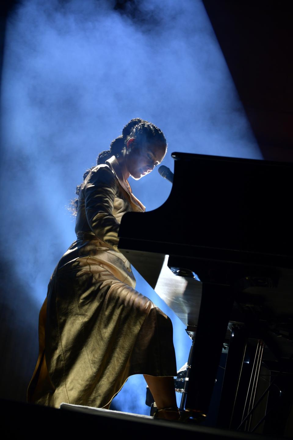 Alicia Keys performs at amfAR. - Credit: Stephane Feugere / WWD