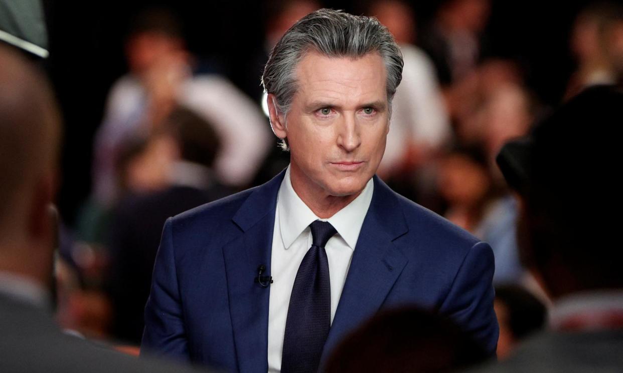 <span>Gavin Newsom speaks to members of the press on the day of the first 2024 presidential debate in Atlanta, Georgia, on 27 June 2024.</span><span>Photograph: Marco Bello/Reuters</span>