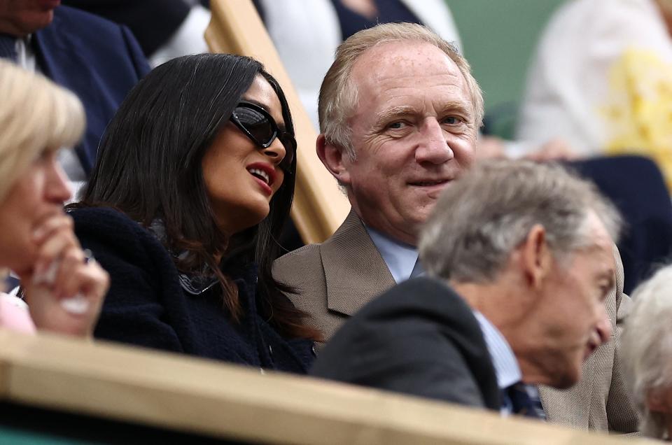 It's all smiles for Salma Hayek and François-Henri Pinault in the stands at Wimbledon on July 7.