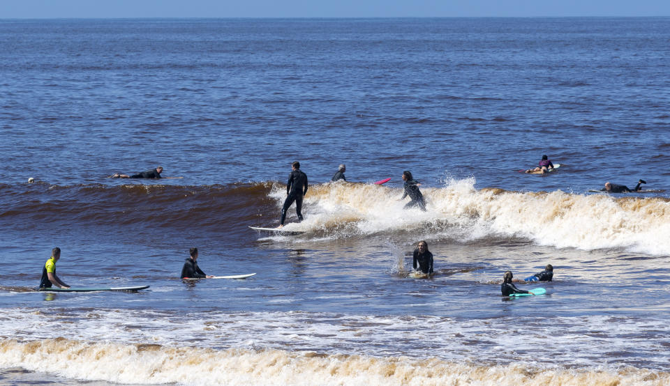 SAN CLEMENTE, CA - MAY 05: Surfers were back on the waves at T Street in San Clemente, CA on Tuesday, May 5, 2020. The city opened its beaches for daily active use after coordinating with Gov. Gavin Newsom"u2019s office to maintain social distancing during the COVID-19 (coronavirus) lockdown. (Photo by Paul Bersebach/MediaNews Group/Orange County Register via Getty Images)