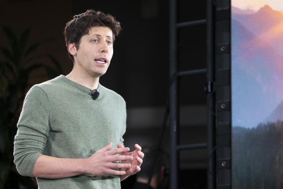 Sam Altman speaking at an event