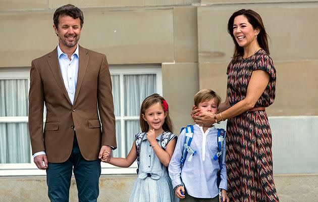 Princess Mary laughed as she held on to her son to comfort him. Photo: Getty Images