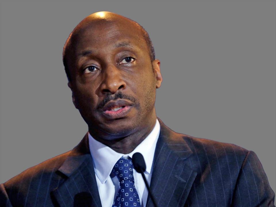 Kenneth Frazier  headshot, as Merck pharmaceutical company Chairman of the board, president, and CEO, graphic element on gray