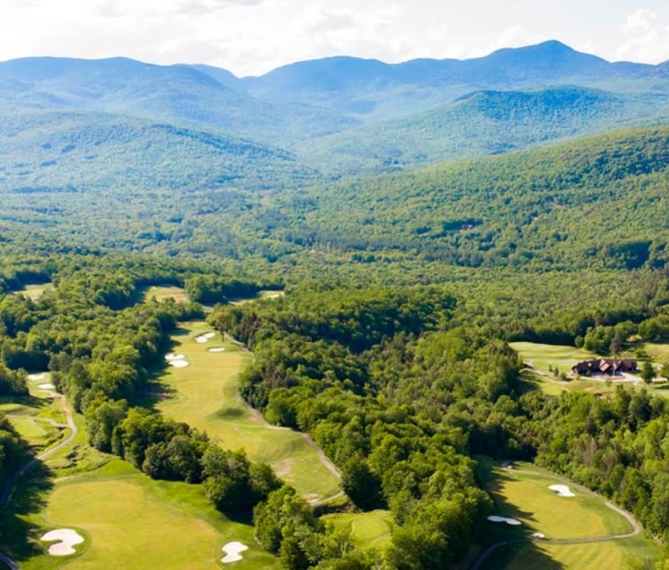 <p>Sunday River could make a case for the most scenic course in all of New England. Backdropped by the Mahoosuc Range, golfers are treated to stunning mountain scenery on every hole. Robert Trent Jones Jr. sketched its dramatic routing through the majestic hardwoods of Maine; the course gifts players with generous fairways but challenges them with tough greens.</p><p>The signature 14th hole, a lengthy par-3 protected by a mammoth waste bunker, plays into a Redan-style green. Translation: It’s well-defended, making par a hard-earned feat.</p>