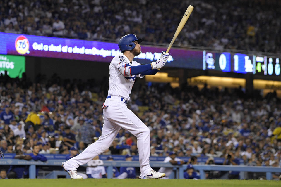 Los Angeles Dodgers' Cody Bellinger hits a three-run home run during the fourth inning of a baseball game against the Colorado Rockies Friday, Sept. 30, 2022, in Los Angeles. (AP Photo/Mark J. Terrill)