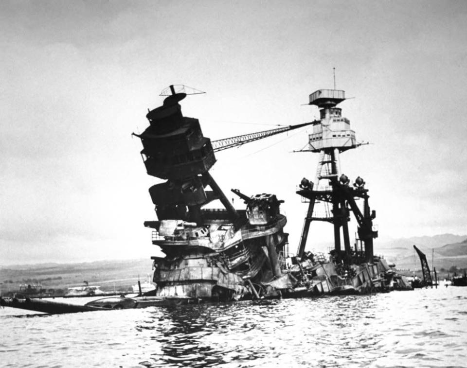 Not originally published in LIFE. The exposed wreckage of the battleship USS Arizona. (Bob Landry—Time & Life Pictures/Getty Images) <br> <br> <a href="http://life.time.com/history/pearl-harbor-photos-from-the-pacific-and-the-home-front-1941-1942/#1" rel="nofollow noopener" target="_blank" data-ylk="slk:Click here to see the full collection at LIFE.com;elm:context_link;itc:0;sec:content-canvas" class="link ">Click here to see the full collection at LIFE.com</a>