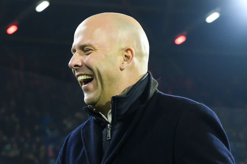 Feyenoord head coach Arne Slot smiles before the KNVB Cup semi-final match against Groningen.