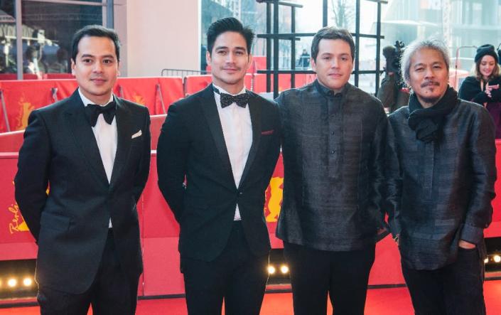 (L-R) Actors John Lloyd Cruz, Piolo Pascual, Paul Soriano and director Lav Diaz pose prior to the premiere of the 8-hour-long Filipino film "A Lullaby to the Sorrowful Mystery" during the Berlinale Film Festival in Berlin on February 18, 2016 (AFP Photo/John MacDougall)