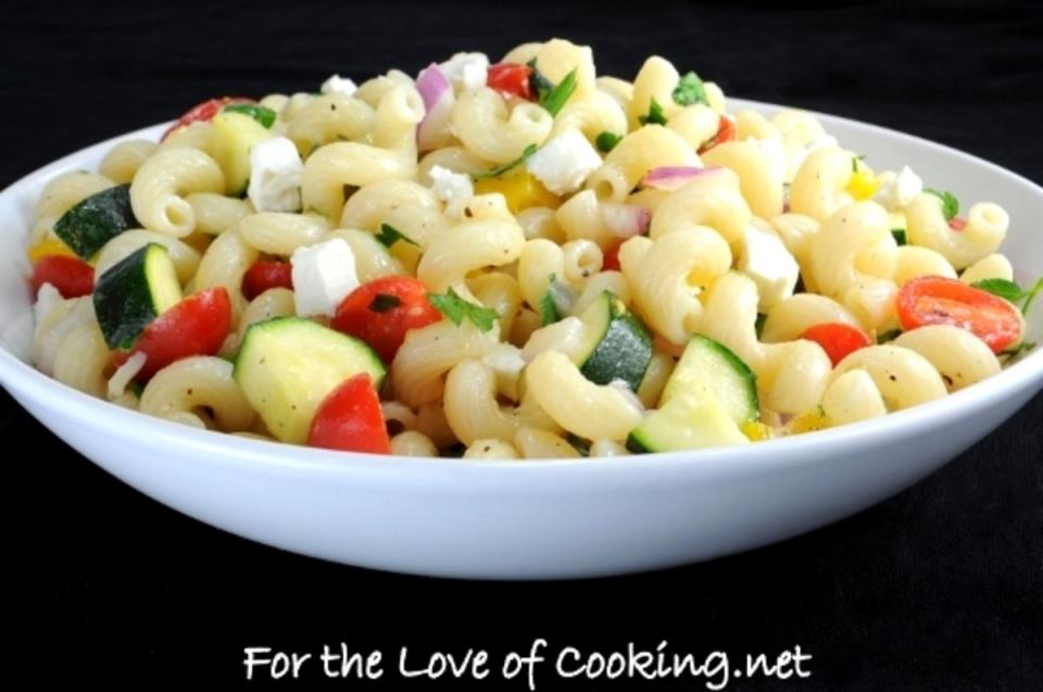 <p>For the Love of Cooking</p><p>This colorful salad is fresh, light, and delicious.</p><p><strong>Get the recipe: <a href="http://www.fortheloveofcooking.net/2012/09/pasta-salad-tomatoes-zucchini-and-feta.html" rel="nofollow noopener" target="_blank" data-ylk="slk:Pasta Salad with Tomatoes, Zucchini, and Feta;elm:context_link;itc:0;sec:content-canvas" class="link ">Pasta Salad with Tomatoes, Zucchini, and Feta</a></strong></p>