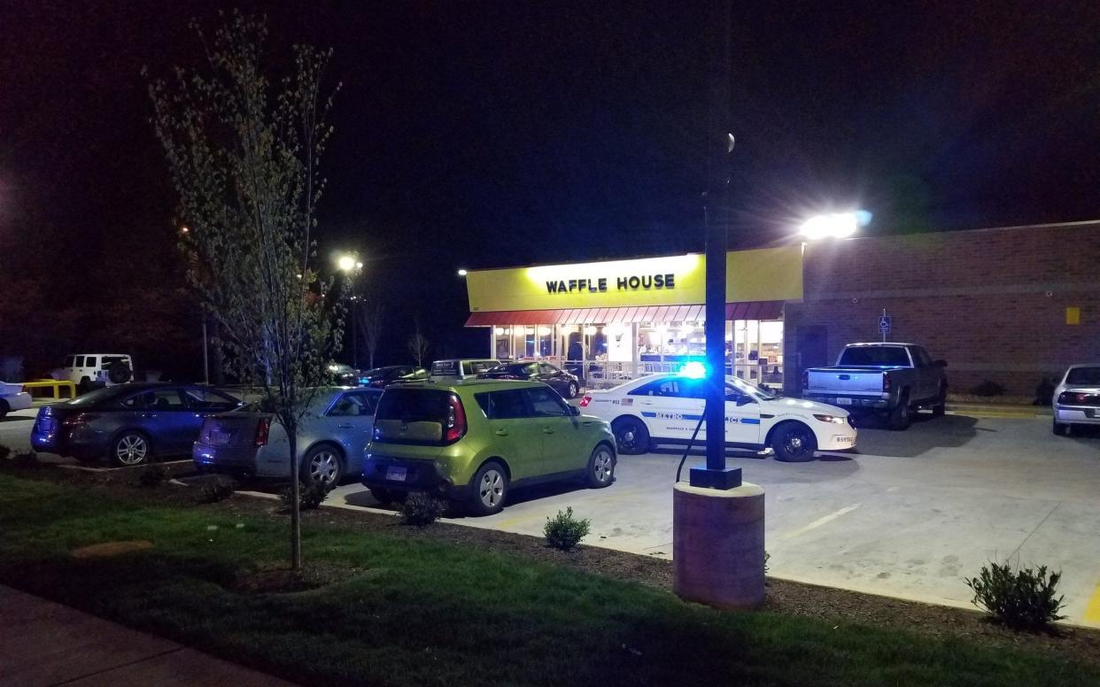 Police outside the Waffle House following the shooting - Metro Nashville Police Department