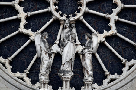 A view shows statues of the western rose window of Notre-Dame Cathedral after a massive fire devastated large parts of the gothic structure in Paris, France, April 16, 2019. REUTERS/Benoit Tessier