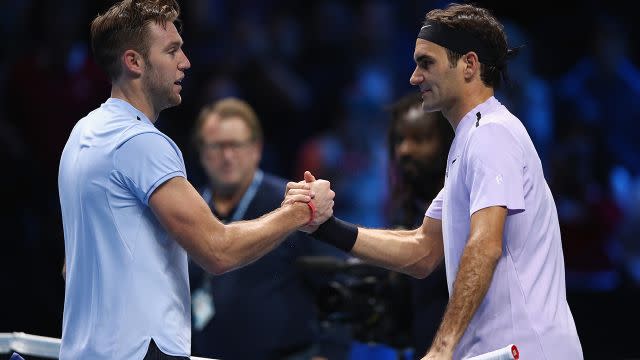 Sock (left) and Federer after the match. Image: Getty