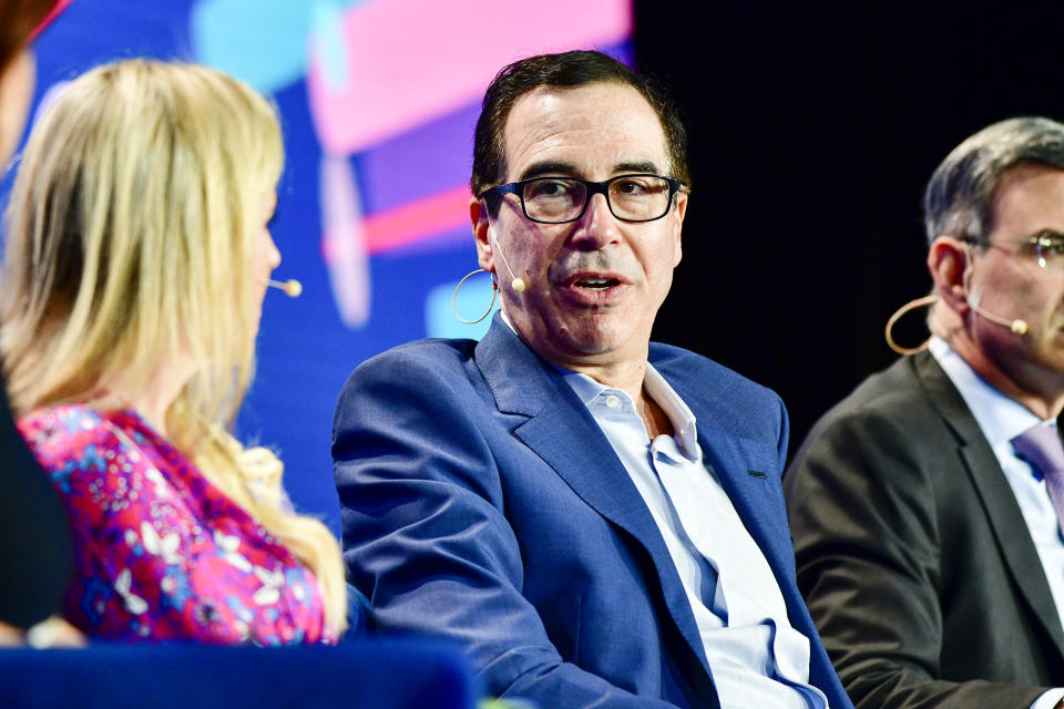 BEVERLY HILLS, CALIFORNIA - MAY 02: (L-R) Elizabeth Burton, 77th US Secretary of Treasury Steven T. Mnuchin and Peter Orszag attend the 2023 Milken Institute Global Conference at The Beverly Hilton on May 02, 2023 in Beverly Hills, California. (Photo by Jerod Harris/Getty Images)