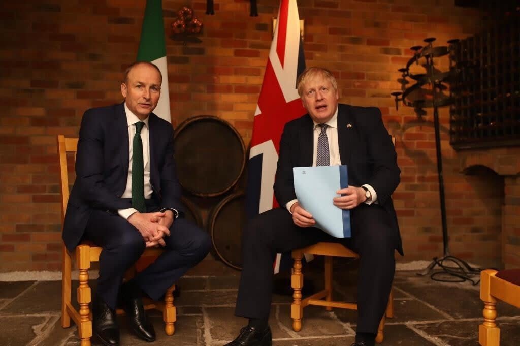 Taoiseach Micheal Martin speaking to Prime Minister Boris Johnson at Twickenham Stadium during his visit to the UK (Irish Government/PA) (PA Media)