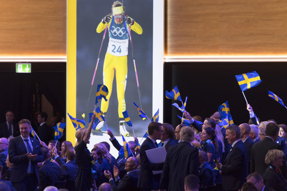 FILE - Stockholm-Are delegation members celebrate during the presentation final presentation of the Stockholm-Are candidate cities the first day of the 134th Session of the International Olympic Committee (IOC), at the SwissTech Convention Centre, in Lausanne, on June 24, 2019. For an ailing search for a 2030 Olympics host now to have Sweden emerge as frontrunner is a surprise in Stockholm as elsewhere. (Laurent Gillieron/Keystone via AP, File)