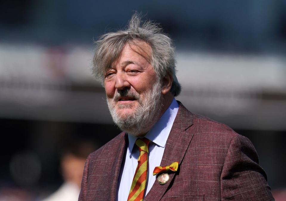 Stephen Fry fell around six feet from a stage while presenting a talk about AI (PA)