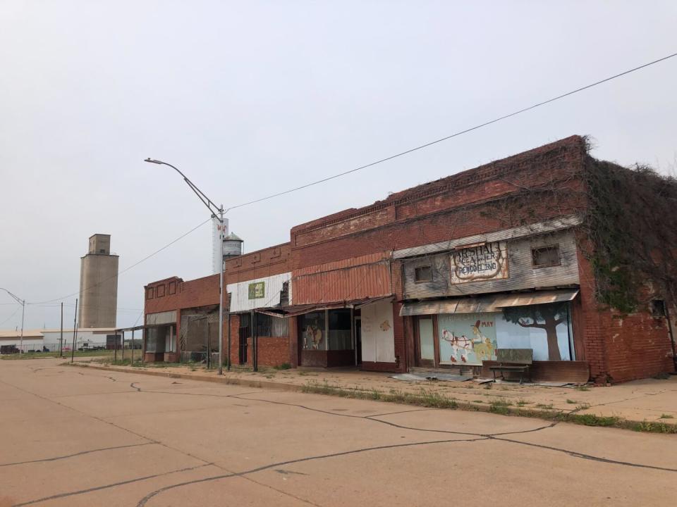 A view of brick buildings along a street