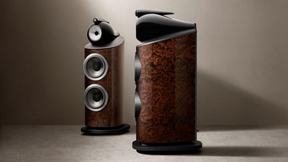 The Bowers & Wilkins 801 D4 Signature loudspeakers presented in California Burl Gloss wood veneer, trimmed in black Connolly leather.