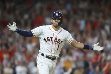FILE PHOTO: May 25, 2019; Houston, TX, USA; Houston Astros shortstop Carlos Correa (1) reacts after hitting a game winning walk off single during the ninth inning against the Boston Red Sox at Minute Maid Park. Mandatory Credit: Troy Taormina-USA TODAY Sports