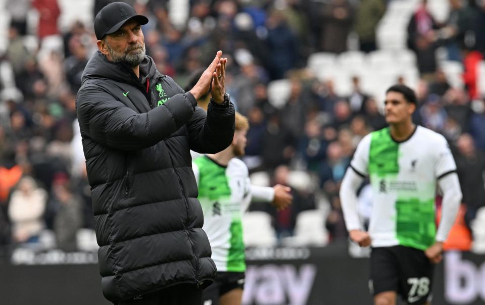 A deflated Jurgen Klopp applauds the Liverpool fans