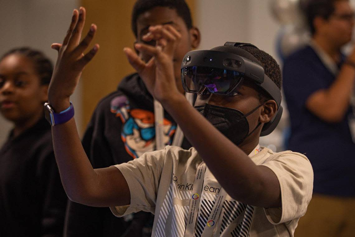 Student Nathaniel Bruno, 12, uses a mixed reality headset during Space Day at Nova Southeastern University in Fort Lauderdale on Oct. 12, 2022.