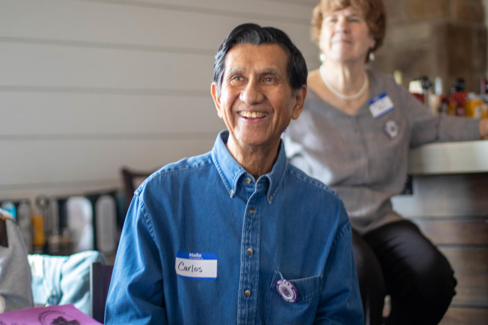 Carlos Simental, one of the Wabash Area Lifetime Learning Association's newest members, smiles as Alan Williams, president of WALLA, tells the audience to welcome Simental to WALLA. WALLA's 30th-year celebration was celebrated on April 22, 2022, at Walt's Pub & Grill on 1050 Kalberer Road, in West Lafayette.