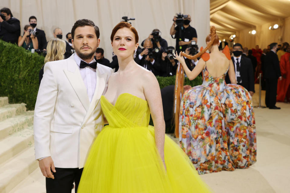 A close up of Kit Harington and Rose Leslie as they pose on the Met Gala red carpet