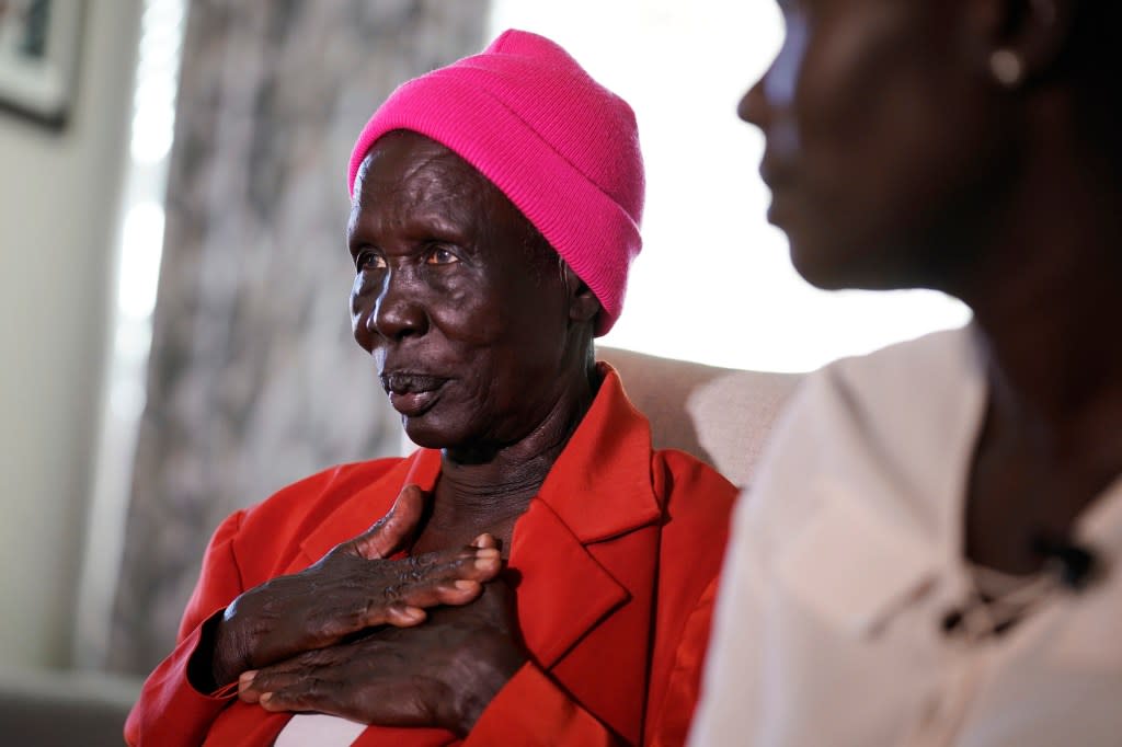 Adeng Ajang of South Sudan, talks about her two granddaughters still in Africa during an interview at her son’s home Wednesday, Nov. 8, 2023, in Haslet, Texas. Ajang and her son and are trying to get the two girls from an African refugee camp to the U.S. (AP Photo/LM Otero)