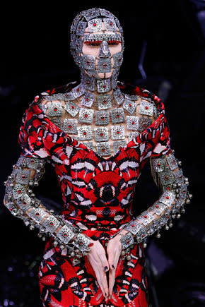 Last fall's McQueen presentation included powerful images of women, like this model, encased in high-fashion armor.