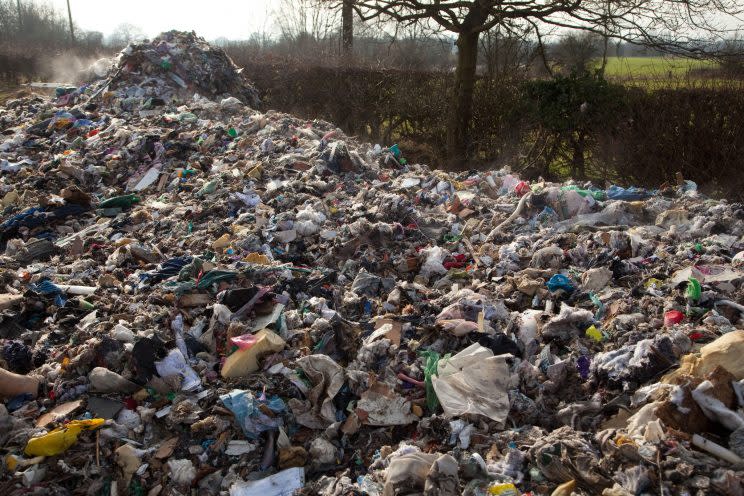 Villagers have been left horrified after a mountain of waste was dumped in a quiet country lane.