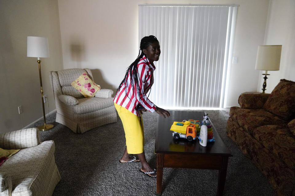 Congo refugee Riziki Kashindi tours her new apartment, Thursday, April 11, 2024, in Columbia, S.C. The American refugee program, which long served as a haven for people fleeing violence around the world, is rebounding from years of dwindling arrivals under former President Donald Trump. The Biden administration has worked to restaff refugee resettlement agencies and streamline the process of vetting and placing people in America. (AP Photo/Erik Verduzco)