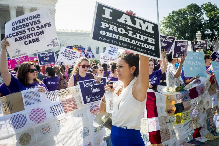 Pro-choice and pro-life activists demonstrate on the steps of the United States Supreme Court on June 27, 2016 in Washington, DC. (Photo: Pete Marovich/Getty Images)