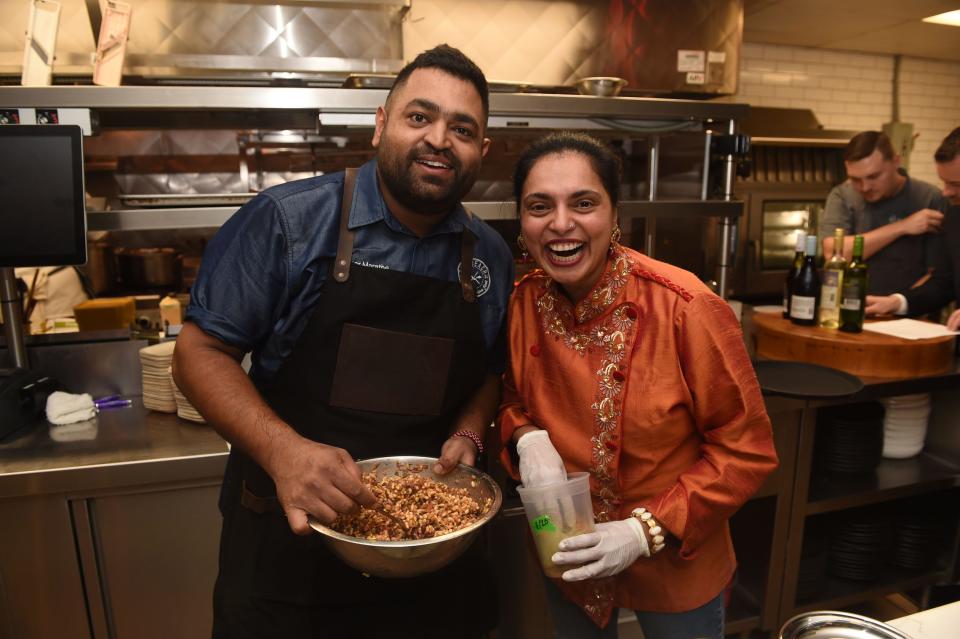 Star chef Maneet Chauhan joins chef Pushkar Marathe at the 2021 Palm Beach Food and Wine Festival's "Spice" dinner at Marathe's Stage Kitchen restaurant in Palm Beach Gardens.