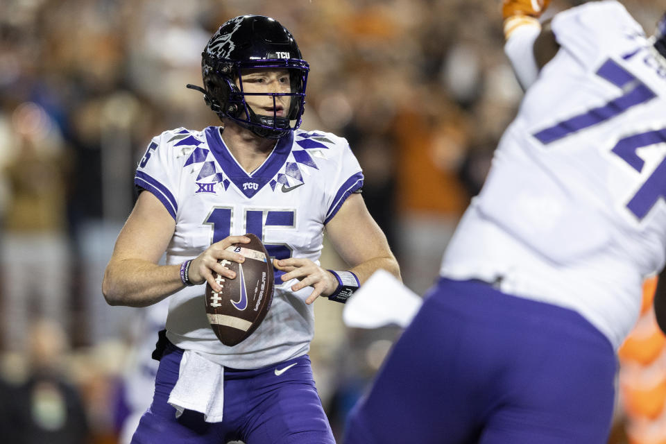 TCU quarterback Max Duggan (15) looks for a receiver during the first half of the team's NCAA college football game against Texas on Saturday, Nov. 12, 2022, in Austin, Texas. (AP Photo/Stephen Spillman)