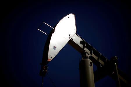 FILE PHOTO: A pumpjack brings oil to the surface in the Monterey Shale, California, April 29, 2013. REUTERS/Lucy Nicholson/File Photo