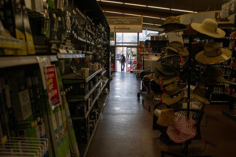 A customer leaves the Hollywood Hardware on Tuesday. The business is closing after 75 years in business.