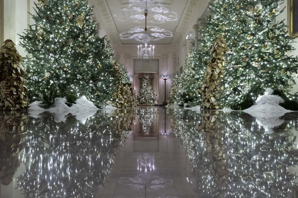 The Cross Hall leading into the State Dinning Room is decorated during the 2019 Christmas preview at the White House, Monday, Dec. 2, 2019, in Washington. | AP—Copyright 2019 The Associated Press. All rights reserved.