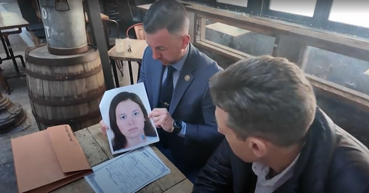 Detective Ryan Glas holding a picture of ‘Midtown Jane Doe’ who has now been identified as Patricia Kathleen McGlone (WNBC)