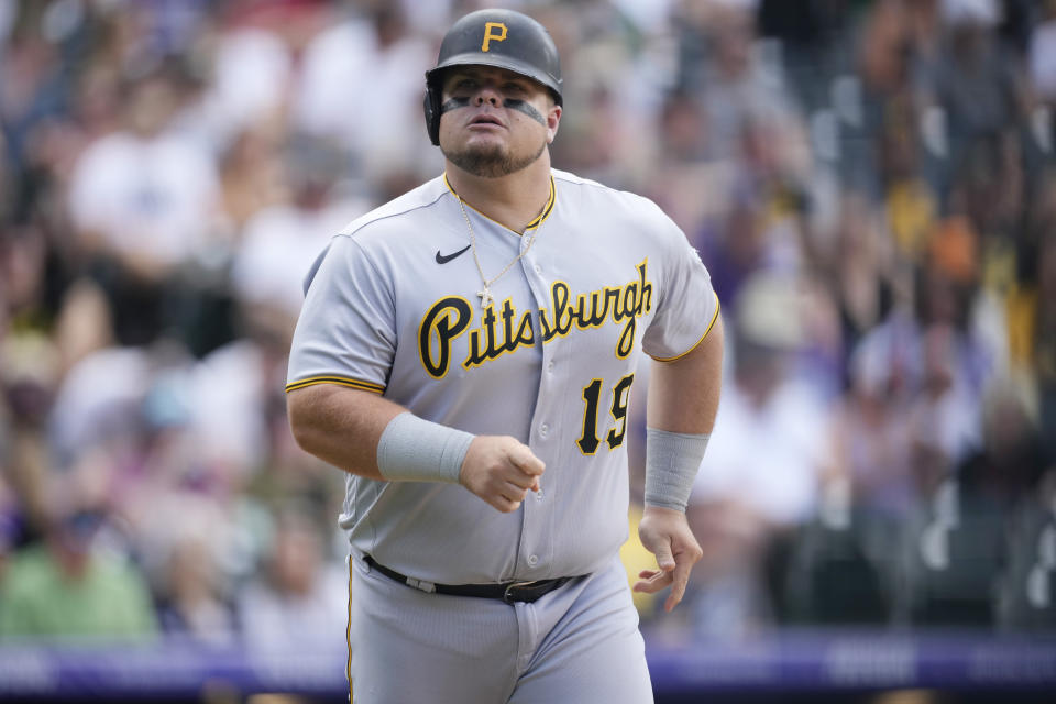 Pittsburgh Pirates' Daniel Vogelbach heads to first base after drawing a walk from Colorado Rockies starting pitcher Jose Urena during the sixth inning of a baseball game Saturday, July 16, 2022, in Denver. (AP Photo/David Zalubowski)