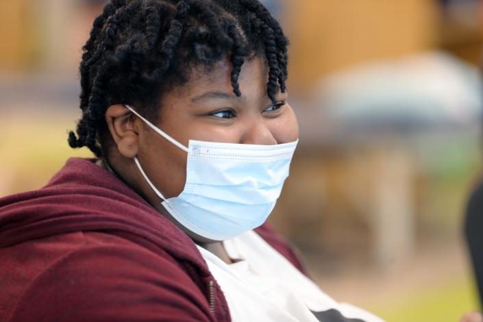 Nicaja Taylor, 14, takes part in her therapy session at Mary Free Bed Rehabilitation Hospital in Grand Rapids. She was diagnosed with COVID-19 last spring and hospitalized because she couldn&#39;t get enough oxygen.