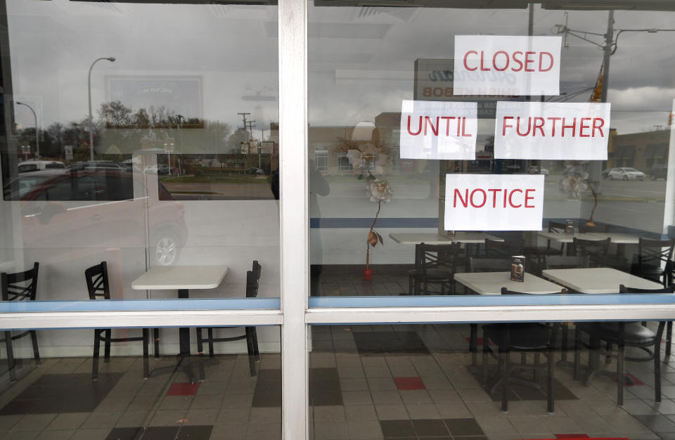 Vasi's Cafe is shown closed in St. Clair Shores, Mich., Friday, May 8, 2020. Many restaurants have closed due to the coronavirus pandemic. (AP Photo/Paul Sancya)