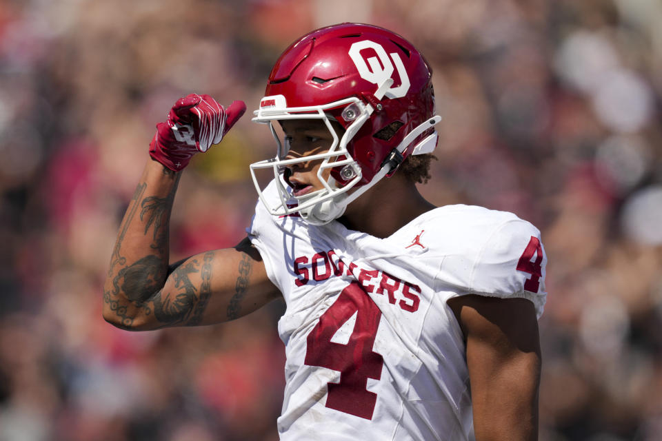 Oklahoma wide receiver Nic Anderson celebrates scoring a touchdown during the first half of an NCAA college football game against Cincinnati, Saturday, Sept. 16, 2023, in Cincinnati. (AP Photo/Aaron Doster)