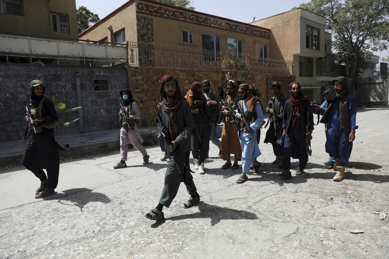 Taliban fighters patrol in the Wazir Akbar Khan neighborhood in the city of Kabul, Afghanistan, Wednesday, Aug. 18, 2021. The Taliban declared an 