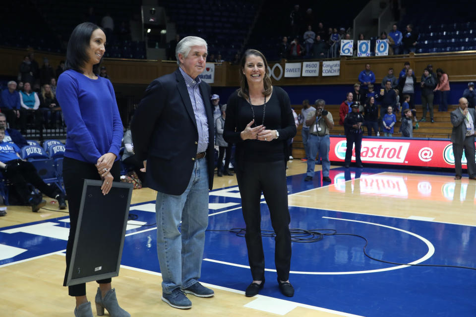 DURHAM, NC - DECEMBER 29: Duke head coach Joanne P. McCallie (right), with athletic director Kevin White and Deputy Director of Athletics Nina King, is honored after winning her 600th game as a head coach during the Duke Blue Devils game versus the Liberty Flames on December 29, 2017, at Cameron Indoor Stadium in Durham, NC. (Photo by Andy Mead/YCJ/Icon Sportswire via Getty Images)