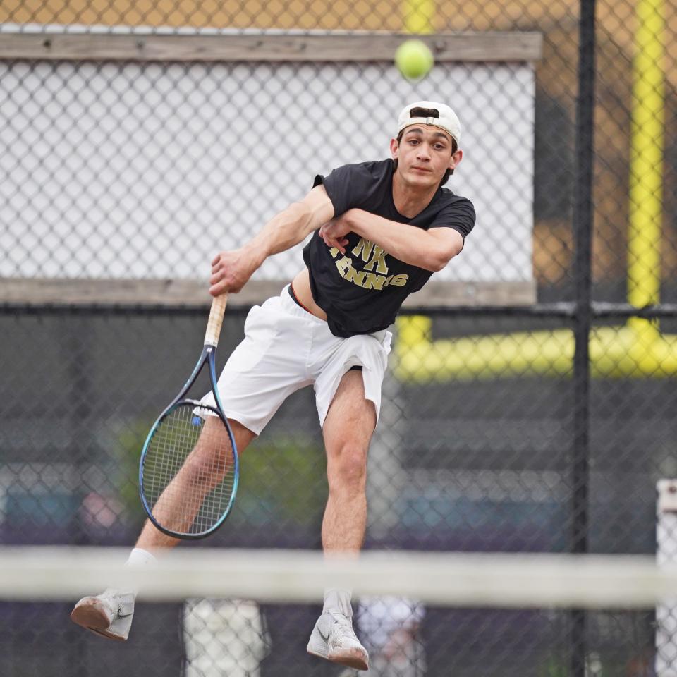 North Kingstown's Charlie Lawton keeps his eye on the ball after unleashing a serve during the third set of his match at No. 1 singles Tuesday. Lawton didn't get a win, but the Skippers did with a 6-1 win over Classical that sends a message to the rest of D-II.