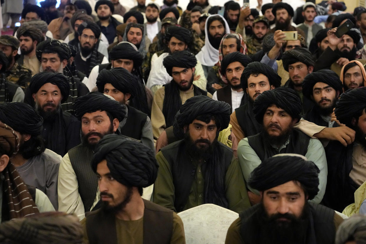 CORRECTS THAT BASHIR NOORZAI WAS RELEASED FROM AN AMERICAN PRISON NOT GUANTANAMO BAY -Taliban fighters and supporters attend a release ceremony for Bashir Noorzai, a senior Taliban detainee held at an American prison, at the Intercontinental Hotel, in Kabul, Afghanistan, Monday, Sept. 19, 2022. Noorzai, a notorious drug lord and member of the Taliban, told reporters in Kabul on Monday that he spent 17 years and six months in a U.S. prison. Taliban-appointed Foreign Minister Amir Khan Muttaqi said Monday that a released American, in what appears to have been part of a swap, was Mark Frerichs, a Navy veteran and civilian contractor kidnapped in Afghanistan in 2020. (AP Photo/Ebrahim Noroozi)