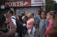 <p>Demonstrators march through the South Shore neighborhood protesting the shooting death of 37-year-old Harith Augustus on July 16, 2018 in Chicago, Ill. (Photo: Scott Olson/Getty Images) </p>